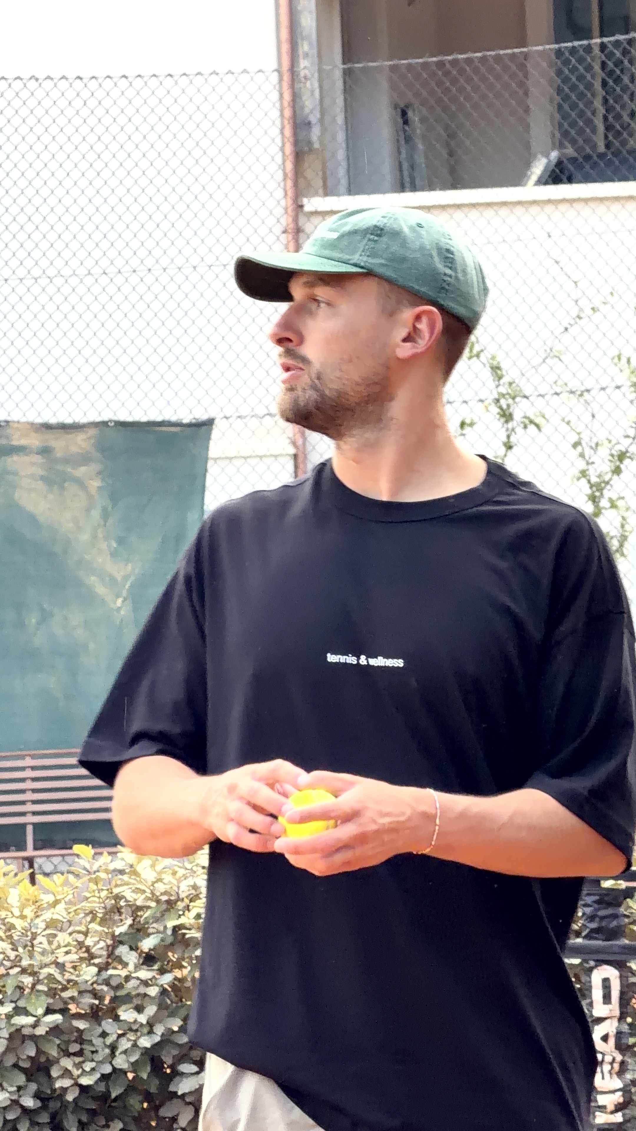 Gintas Lapinskas on tennis court