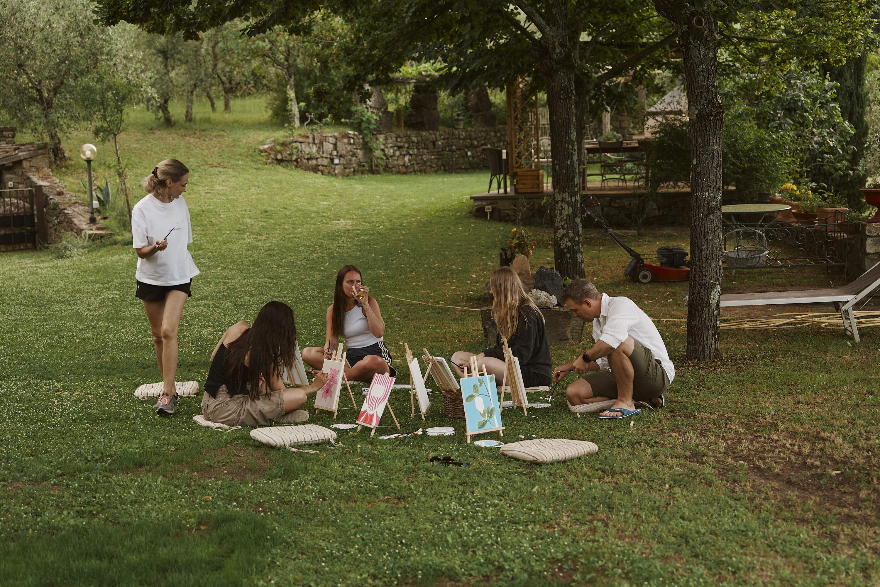 Outdoor painting session on the villa lawn