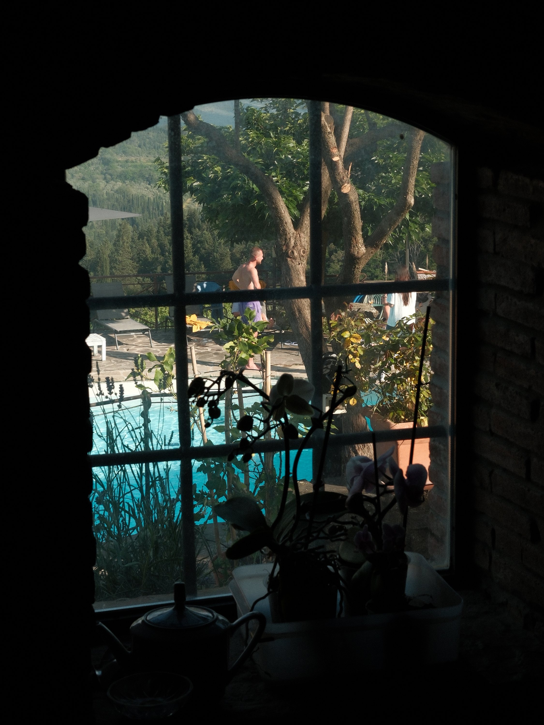 The pool seen from the villa's kitchen window